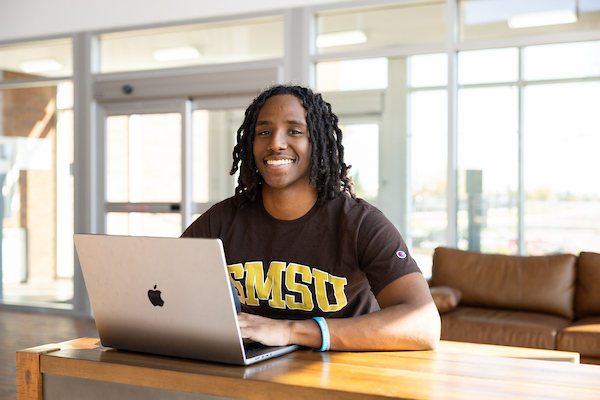 student on computer